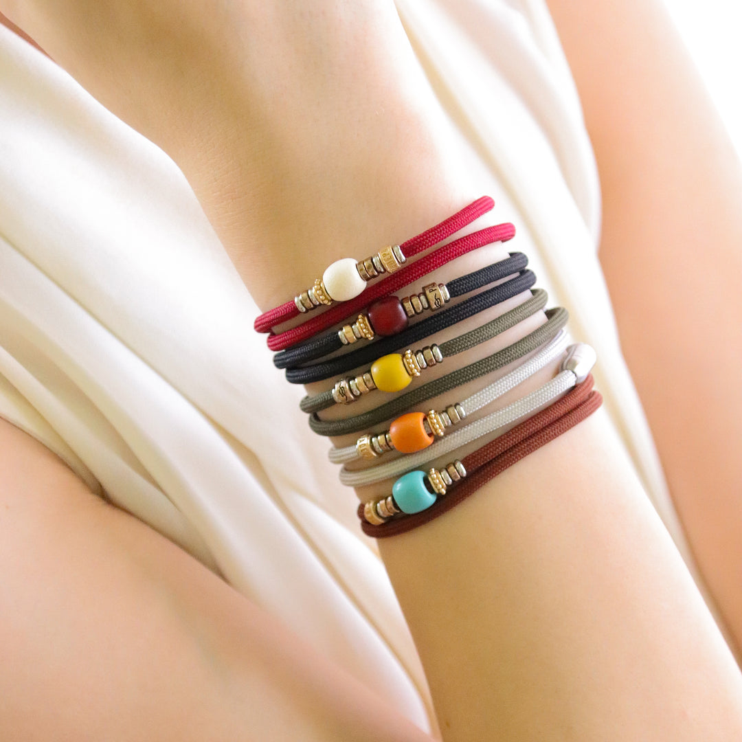 Double garnet nylon bracelet with white Senira resin