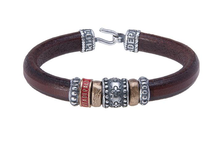 Leather bracelet with silver and bronze pieces