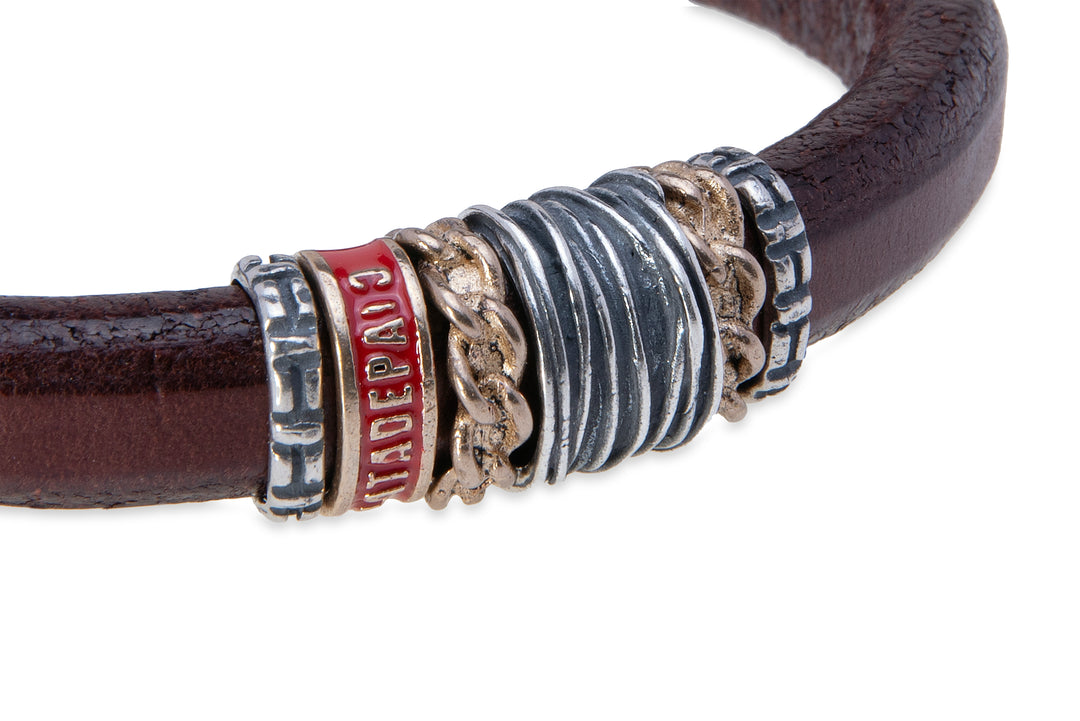 Leather bracelet with silver and bronze pieces