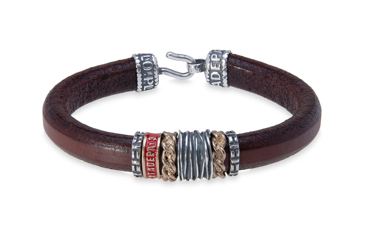 Leather bracelet with silver and bronze pieces