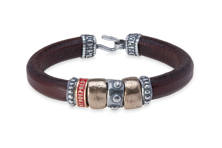 Leather bracelet with silver and bronze pieces