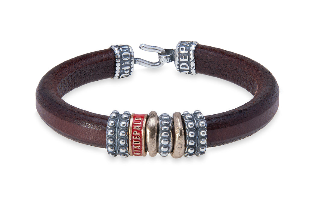 Leather bracelet with silver and bronze pieces