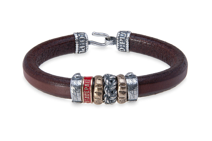 Leather bracelet with silver and bronze pieces