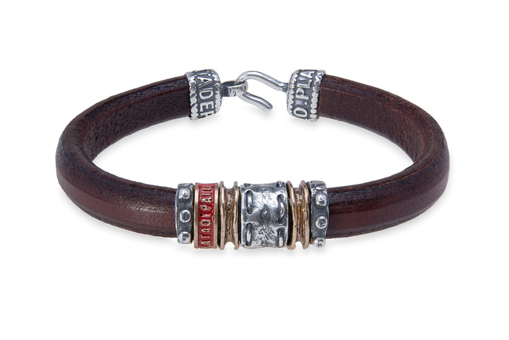 Leather bracelet with silver and bronze pieces