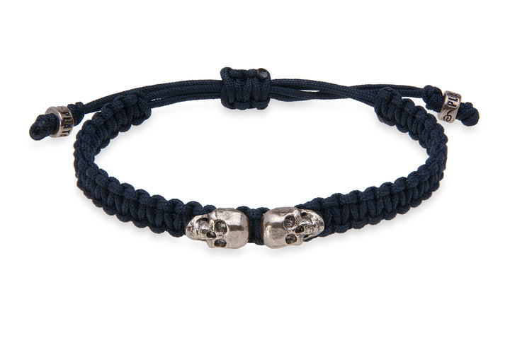 Pulsera de nylon negro con calaveras de bronce Lito