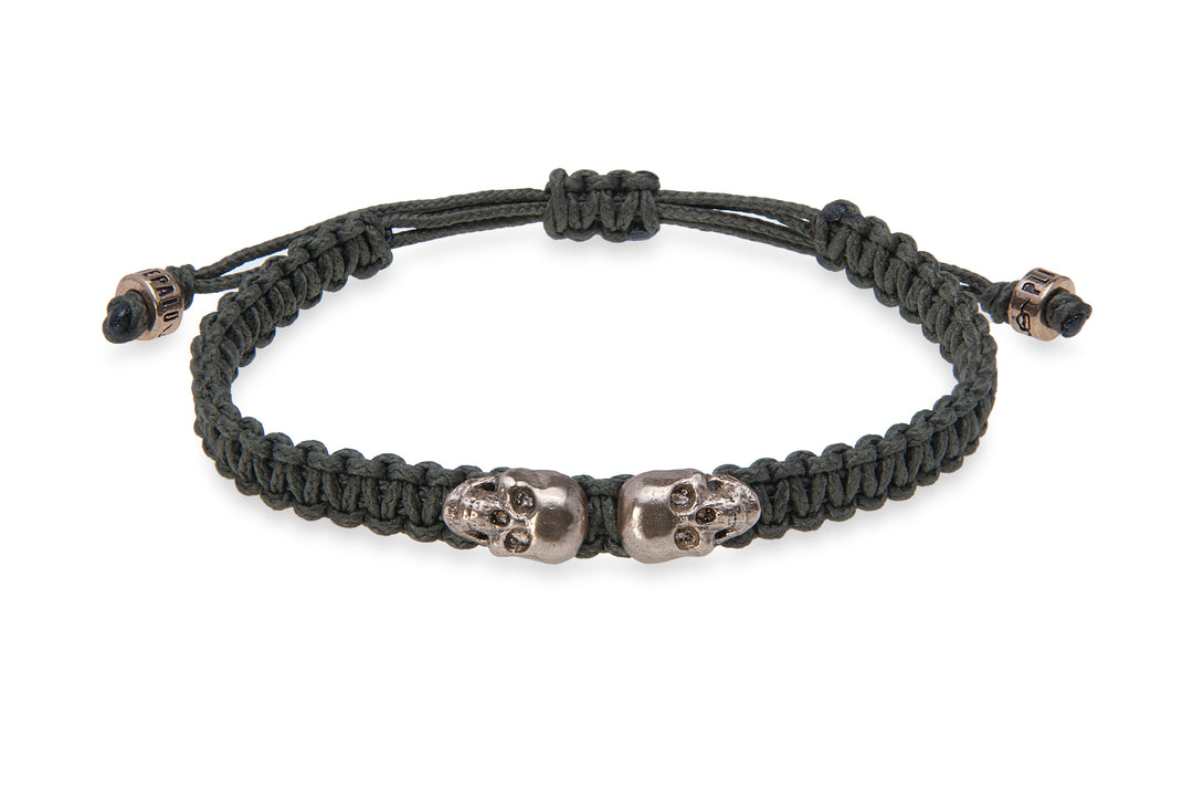 Green nylon bracelet with bronze skulls