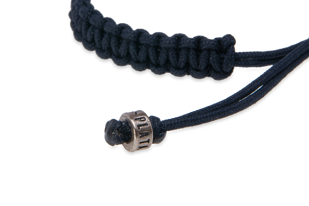 Black nylon bracelet with silver skulls