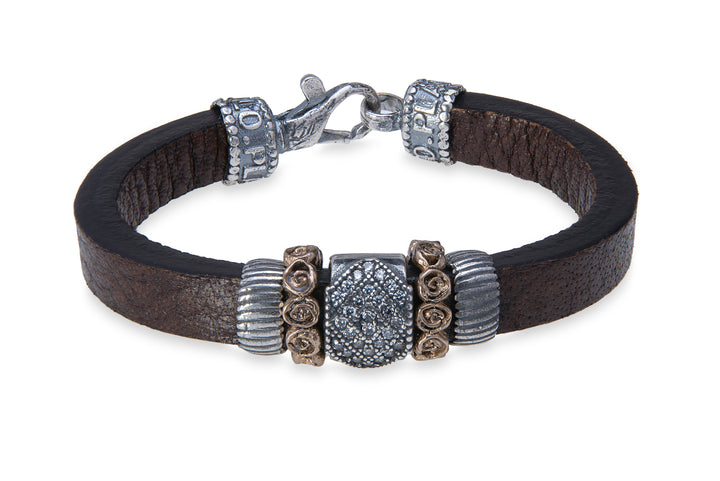 Leather bracelet with silver, bronze and zircon pieces