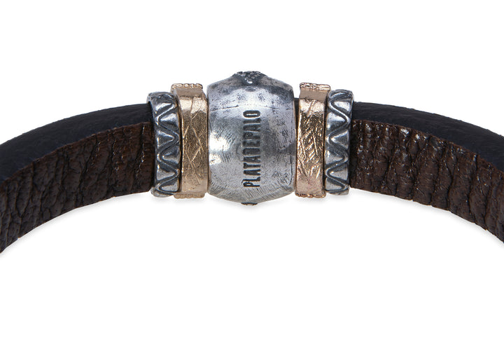 Leather bracelet with silver, bronze and zircon pieces