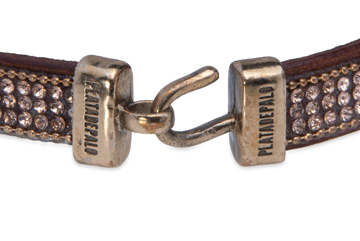 Brown leather bracelet with braiding