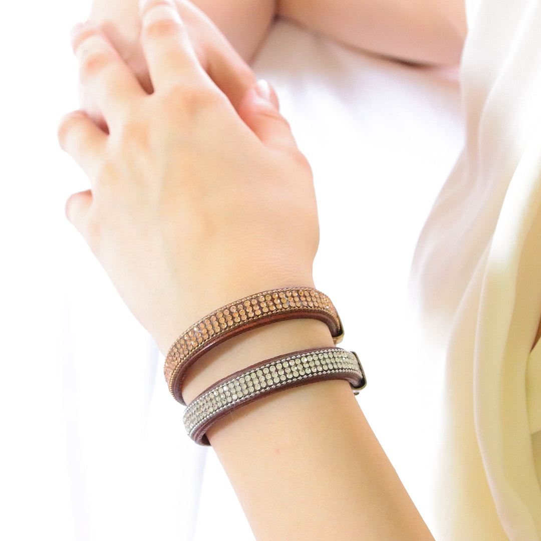 Brown leather bracelet with braiding