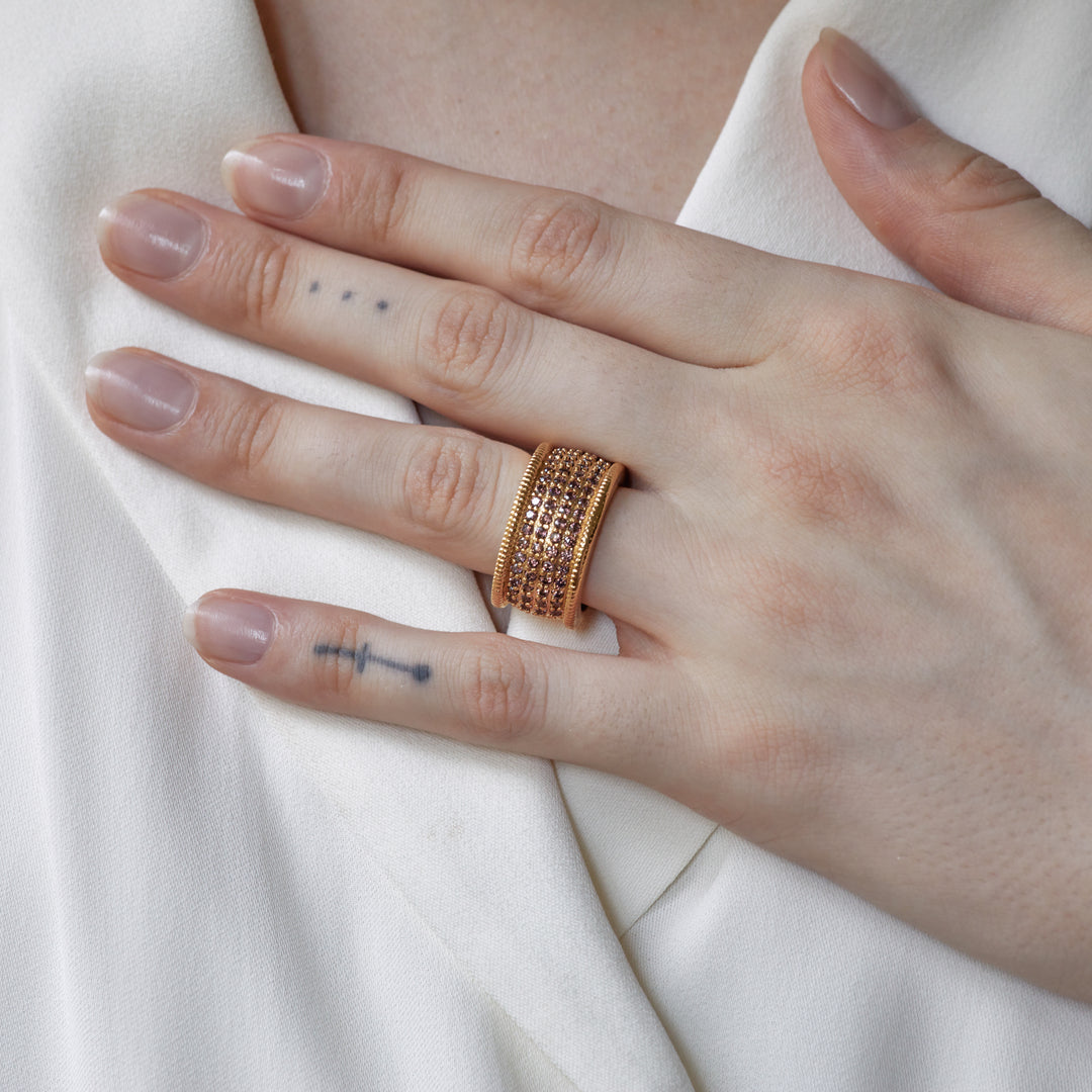 Gold plated bronze ring with brown zircons