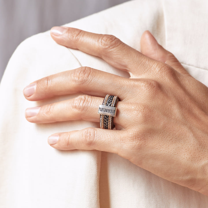 Leather ring with silver trimmings