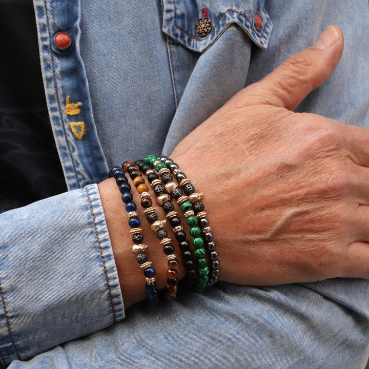 Pulsera de bolas de hematite gris con calavera bronce 3