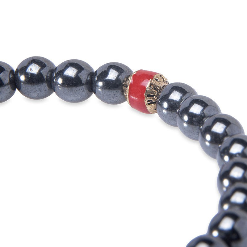 Pulsera de bolas de hematite gris con calavera bronce 2