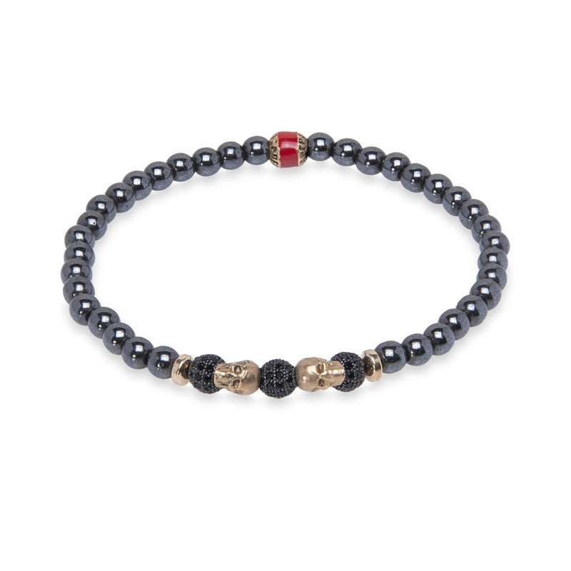 Pulsera de bolas de hematite gris con calaveras de bronce 1