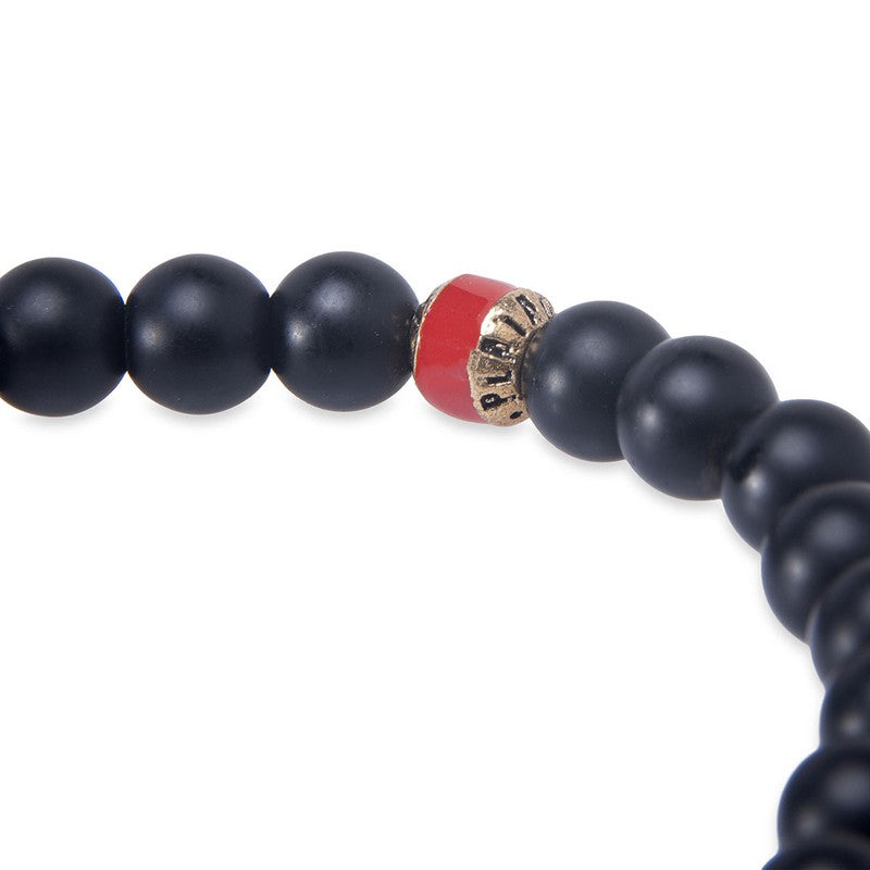 Pulsera de bolas de onix mate con calavera de bronce 2