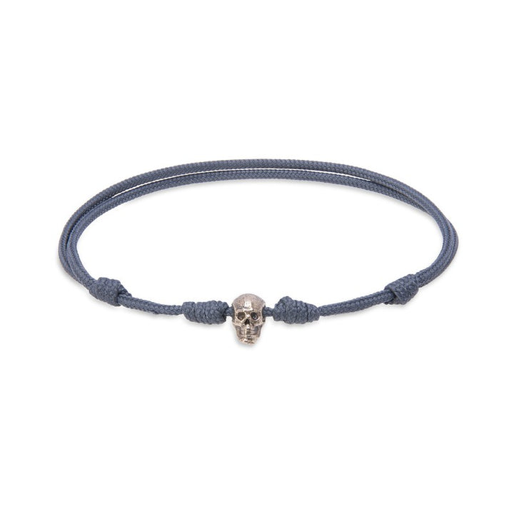 Pulsera de nylon gris con calavera de bronce 1