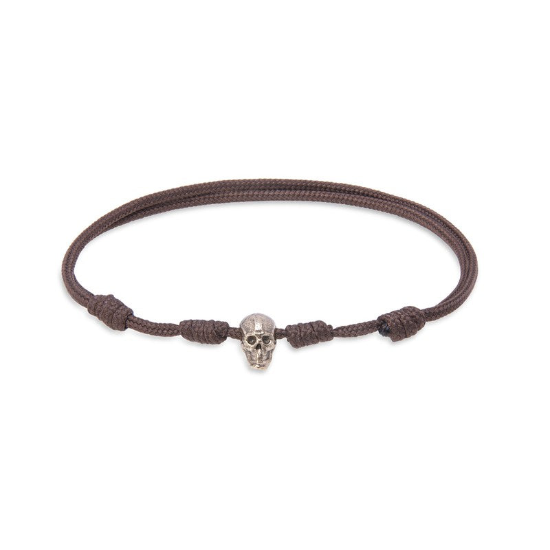 Pulsera de nylon marrón con calavera de bronce 1