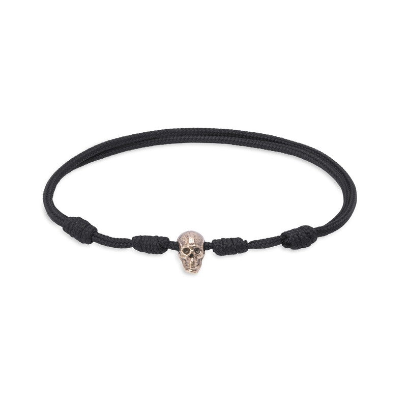 Pulsera de nylon negro con calavera en bronce 1